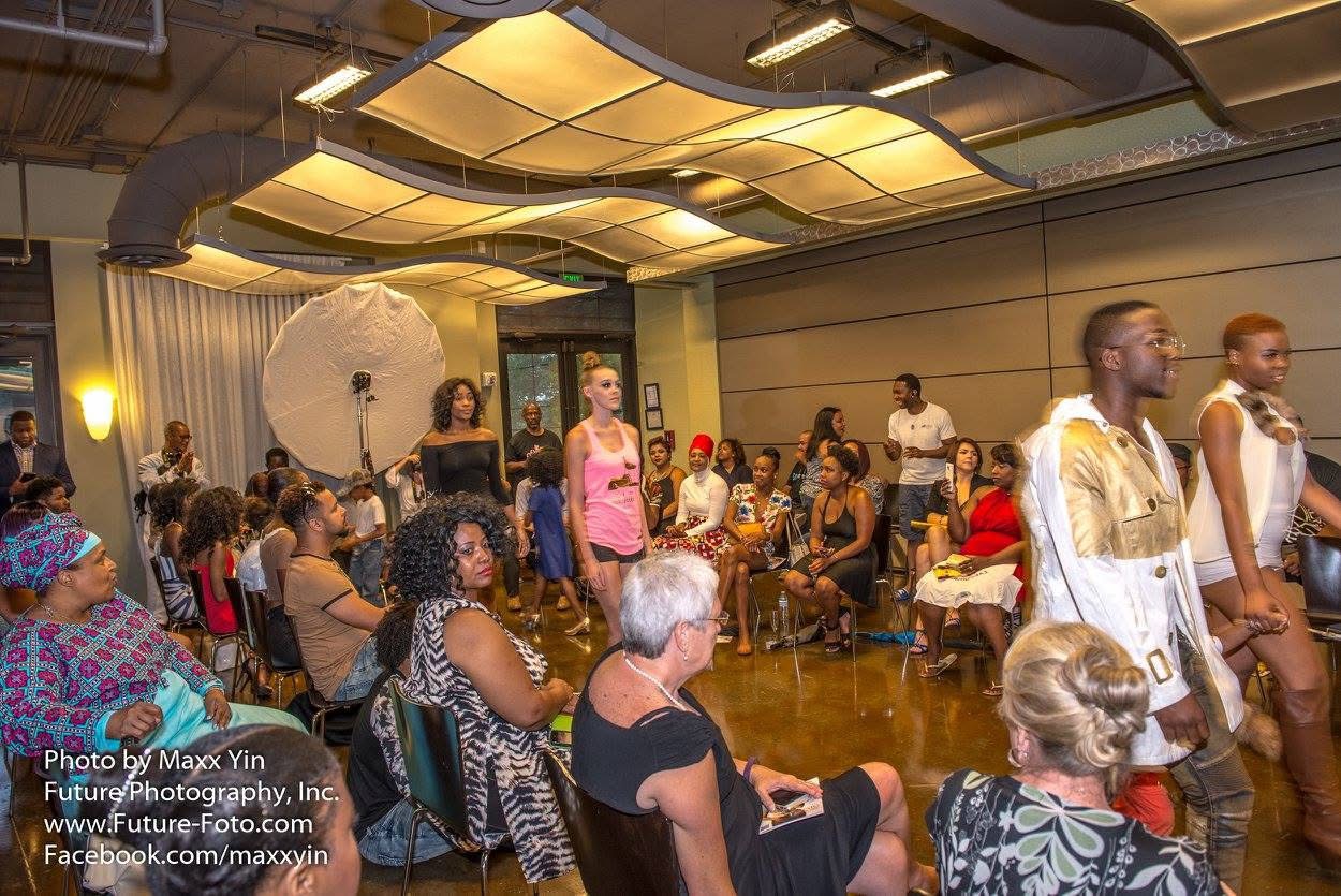 A model walking the Fire on the Runway stage